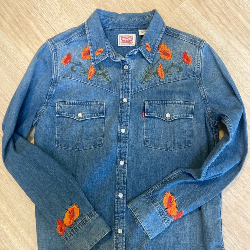 Levi’s women’s medium embroidered jean shirt.